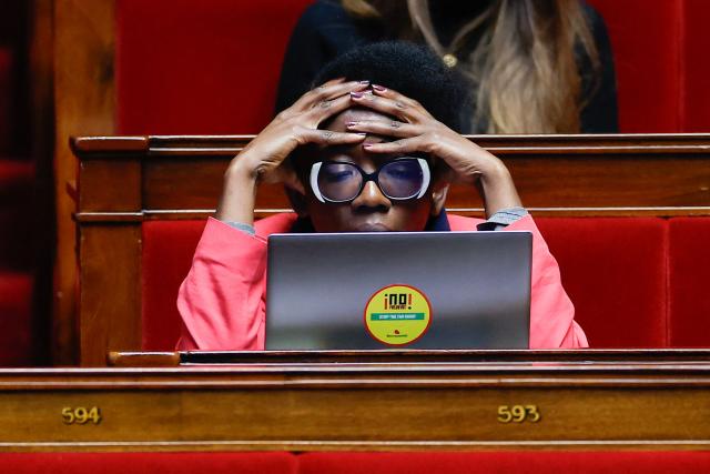 La France Insoumise - Nouveau Front Populaire's MP Elisa Martin attends a voting session focused on the second part of the 2026 social security budget bill (PLFSS) at the National Assembly, the French Parliament lower house, in Paris on December 5, 2025. (Photo by Ian LANGSDON / AFP)