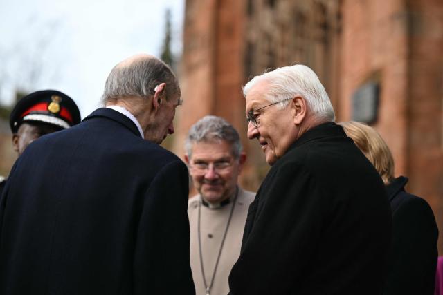 Britain's Prince Edward, Duke of Kent (L) and President of the Federal Republic of Germany Frank-Walter Steinmeier (R) tour the ruins of the old Cathedral in Coventry, central England on December 5, 2025, the final day of a three-day State visit to the UK by the German President. (Photo by Oli SCARFF / POOL / AFP)