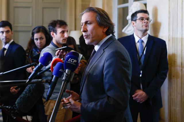 Socialistes et Apparentes' MP Jerome Guedj addresses media after Members of Parliament adopted the revenue section during a voting session focused on the second part of the 2026 social security budget bill (PLFSS) at the National Assembly, the French Parliament lower house, in Paris on December 5, 2025. (Photo by Ian LANGSDON / AFP)