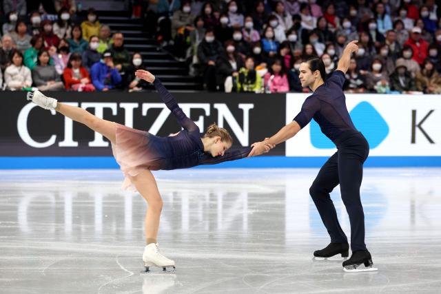 Germany's Minerva Fabienne Hase and Nikita Volodin compete in the Senior Pairs Free Skating at the ISU Grand Prix of Figure Skating Final in Nagoya on December 5, 2025. (Photo by PAUL MILLER / AFP)