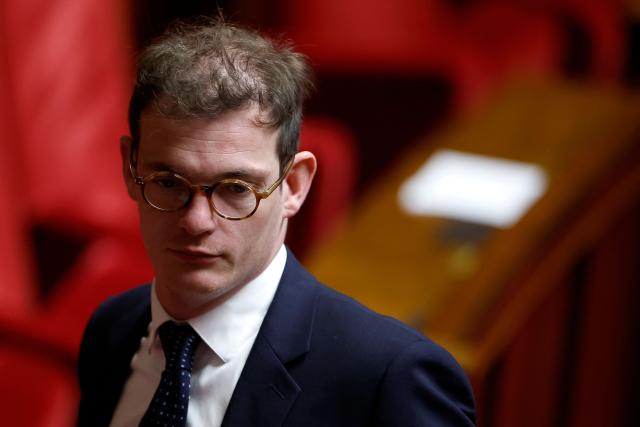 Ensemble Pour la Republique's MP Pierre Cazeneuve looks on during the continuation of the debate on the 2026 social security budget bill (PLFSS) at the National Assembly, the French Parliament lower house, in Paris on December 5, 2025. (Photo by Ian LANGSDON / AFP)