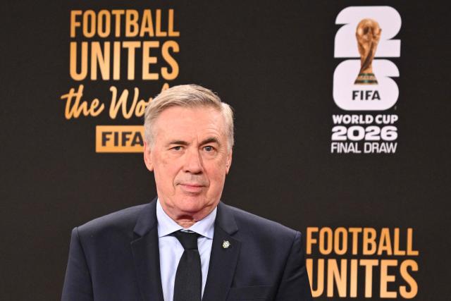 Brazil's Italian head coach Carlo Ancelotti poses on the red carpet upon arrival to attend the draw for the 2026 FIFA Football World Cup taking place in the US, Canada and Mexico, at the Kennedy Center, in Washington, DC, on December 5, 2025. (Photo by Roberto SCHMIDT / AFP)