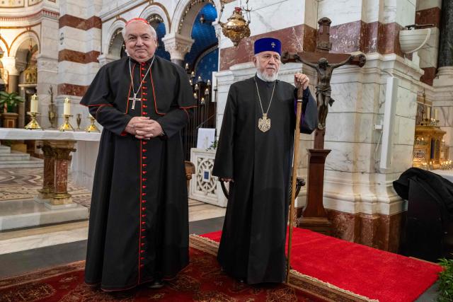 His Holiness Karekin II (R), Supreme Patriarch and Catholicos of all Armenians, and French cardinal Jean-Marc Aveline, Archbishop of Marseille, attend the opening ceremony of the exhibition "Tresors d'Armenie 1512-1828" at the Notre-Dame de la Garde Basilica in Marseille, on December 5, 2025. (Photo by Miguel MEDINA / AFP)