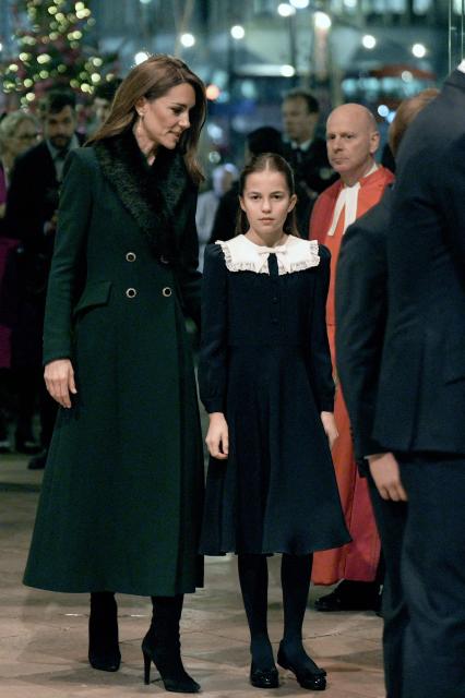 Britain's Princess Charlotte of Wales and Britain's Catherine, Princess of Wales attend the fifth annual "Together At Christmas" Carol Service" at Westminster Abbey in London on December 5, 2025. (Photo by Aaron Chown / POOL / AFP)
