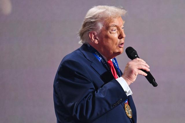 US President Donald Trump delivers his speech after receiving the FIFA Peace Prize during the draw for the 2026 FIFA Football World Cup taking place in the US, Canada and Mexico, at the Kennedy Center, in Washington, DC, on December 5, 2025. (Photo by SAUL LOEB / AFP)