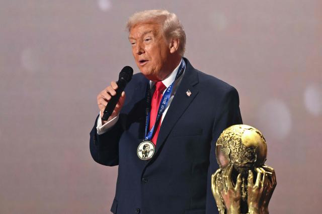 US President Trump speaks as he receives the FIFA Peace Prize during the draw for the 2026 FIFA Football World Cup taking place in the US, Canada and Mexico, at the Kennedy Center, in Washington, DC, on December 5, 2025. (Photo by Mandel NGAN / POOL / AFP)