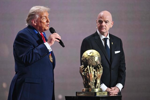 US President Donald Trump delivers his speech after receiving the FIFA Peace Prize from Italian Fifa President Gianni Infantino during the draw for the 2026 FIFA Football World Cup taking place in the US, Canada and Mexico, at the Kennedy Center, in Washington, DC, on December 5, 2025. (Photo by SAUL LOEB / AFP)