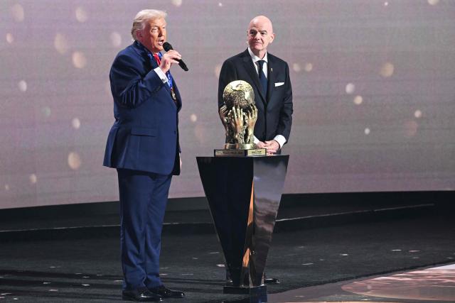 US President Donald Trump delivers his speech after receiving the FIFA Peace Prize from Italian Fifa President Gianni Infantino during the draw for the 2026 FIFA Football World Cup taking place in the US, Canada and Mexico, at the Kennedy Center, in Washington, DC, on December 5, 2025. (Photo by SAUL LOEB / AFP)