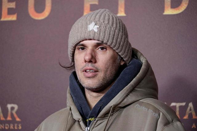 French rapper and songwriter Aurelien Cotentin aka Orelsan poses during a photocall for the European premiere of "Avatar: Fire and Ash" at the Seine Musicale concert hall in Boulogne-Billancourt, on the outskirts of Paris on December 5, 2025. (Photo by STEPHANE DE SAKUTIN / AFP)