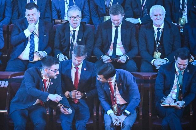 National Team's coaches and guests are seen during the draw for the 2026 FIFA Football World Cup taking place in the US, Canada and Mexico, at the Kennedy Center, in Washington, DC, on December 5, 2025. (Photo by Pedro UGARTE / AFP)