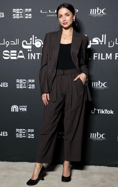 Cuban-born actress Ana de Armas poses during the fifth edition of the Red Sea Film Festival in Jeddah on December 5, 2025. (Photo by PATRICK BAZ / Factstory for the Red Sea International Festival (RSFF) / AFP)