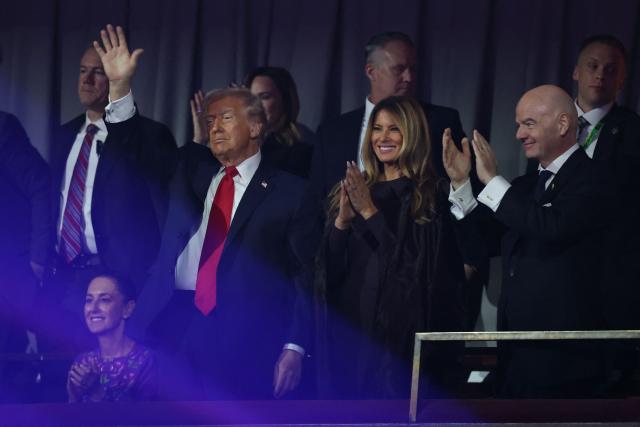 (From L) US President Donald Trump, US First Lady Melania Trump and Italian Fifa President Gianni Infantino react after the results of the draw for the 2026 FIFA Football World Cup taking place in the US, Canada and Mexico, at the Kennedy Center, in Washington, DC, on December 5, 2025. (Photo by Dan Mullan / POOL / AFP)