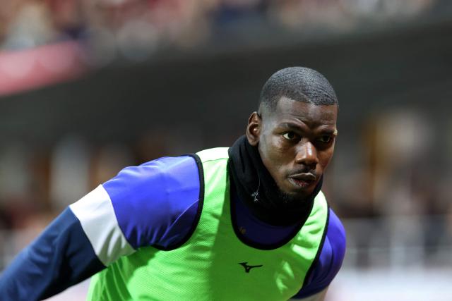Monaco's French midfielder #08 Paul Pogba warms up during the French L1 football match between Stade Brestois 29 (Brest) and AS Monaco at the Francis-Le-Ble stadium in Brest, western France, on December 5, 2025. (Photo by Fred TANNEAU / AFP)