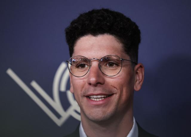 Portuguese cyclist Joao Almeida poses for a photocall ahead of the Velo d'Or 2025 award ceremony at the Pavillon Gabriel in Paris on December 5, 2025. (Photo by Anne-Christine POUJOULAT / AFP)