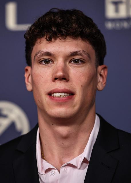 French cyclist Paul Magnier poses for a photocall ahead of the Velo d'Or 2025 award ceremony at the Pavillon Gabriel in Paris on December 5, 2025. (Photo by Anne-Christine POUJOULAT / AFP)