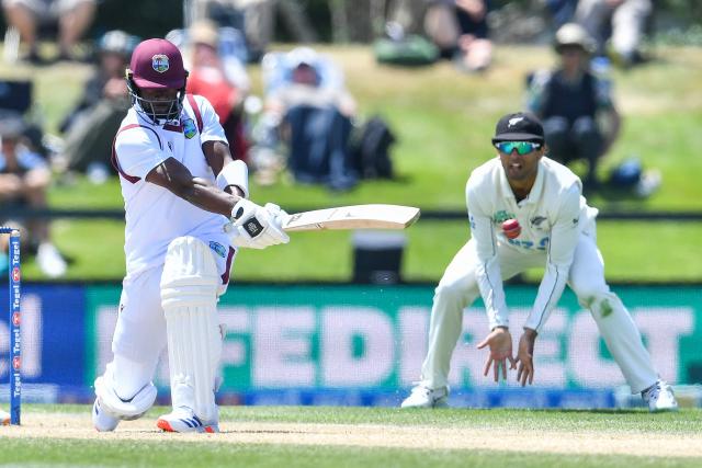 West Indies' Kemar Roach bats during day five of the first Test cricket match between New Zealand and West Indies at Hagley Oval in Christchurch on December 6, 2025. (Photo by Sanka Vidanagama / AFP)