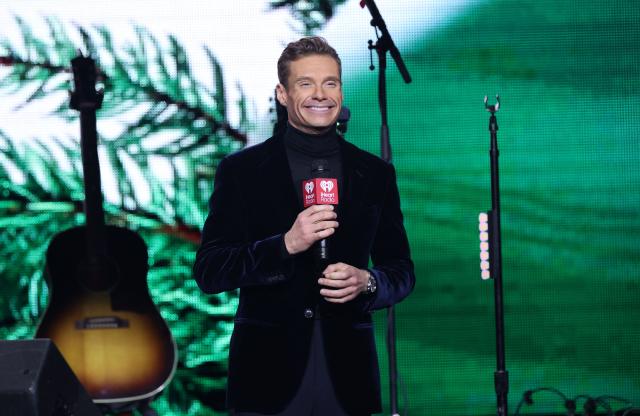 US radio personality and TV host Ryan Seacrest speaks during the KIIS FM's iHeartRadio Jingle Ball 2025 at the Inuit Dome in Inglewood, California on December 4, 2025. (Photo by Michael Tran / AFP)