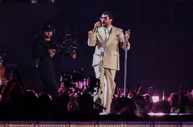 Puerto Rican artist Bad Bunny performs during his "Debi tirar mas fotos" world tour in San Jose, Costa Rica on December 5, 2025. (Photo by EZEQUIEL BECERRA / AFP)