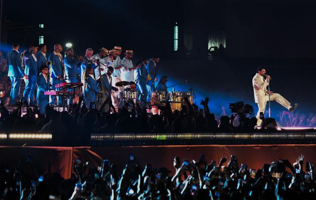 Puerto Rican artist Bad Bunny performs during his "Debi tirar mas fotos" world tour in San Jose, Costa Rica on December 5, 2025. (Photo by EZEQUIEL BECERRA / AFP)
