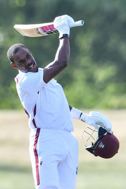 West Indies' Justin Greaves celebrates his double century during day five of the first Test cricket match between New Zealand and West Indies at Hagley Oval in Christchurch on December 6, 2025. (Photo by Sanka Vidanagama / AFP)