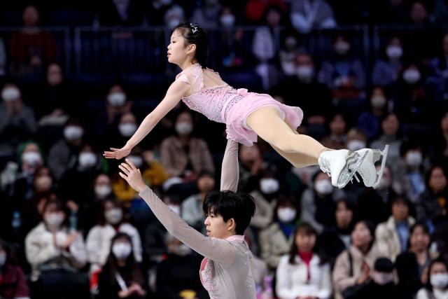 China's Chen Yuxuan and Dong Yinbo compete in the Junior Pairs Free Skating at the ISU Grand Prix of Figure Skating Final in Nagoya on December 6, 2025. (Photo by PAUL MILLER / AFP)