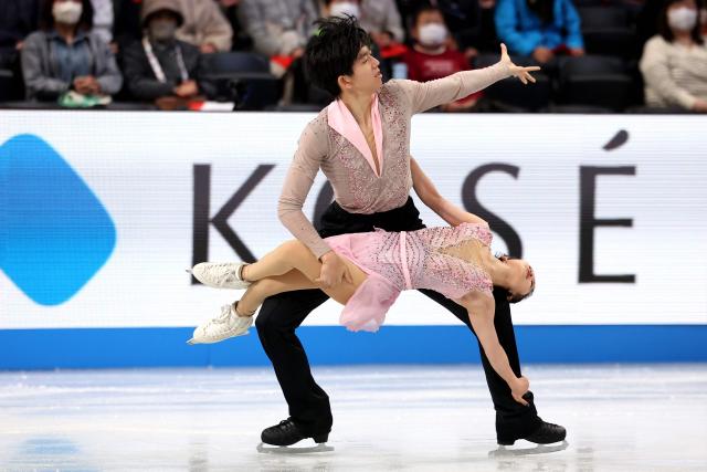 China's Chen Yuxuan and Dong Yinbo compete in the Junior Pairs Free Skating at the ISU Grand Prix of Figure Skating Final in Nagoya on December 6, 2025. (Photo by PAUL MILLER / AFP)
