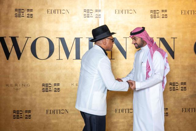Picture of a handshake between Faisal Baltyuor, Red Sea Film Festival CEO, on the right, and  Giancarlo Esposito, on the left, to the "Women In Cinema" gala dinner, as part of the 5th edition of the Red Sea Film Festival in Jeddah, Saudi Arabia on December 5, 2025. (Photo by Ammar ABD RABBO / Red Sea Film Festival / FACTSTORY) / Disclaimer: This document is neither produced nor endorsed by AFP. It is distributed under its issuer sole responsibility. Its reproduction is authorized in context without any distortion of content. If you have any question about this document, please contact its issuer.