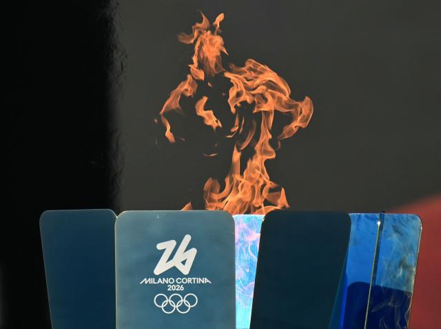 This photograph shows the cauldron at the Stadio dei Marmi (Stadium of the Marbles) one of four stadiums located in the Foro Italico sports complex during the Torch Relay to Milano Cortina 2026 Olympic Games, in Rome on December 6, 2025. (Photo by Alberto PIZZOLI / AFP)