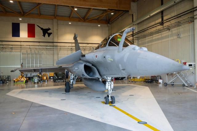 This photograph shows a French Air and Space Force Dassault Rafale C-5GN fighter jet displayed during a media presentation on the implementation of the National Service scheme, including an initial military training and support for young volunteers within the Air and Space Force (AAE), at the training centre of Air Base 115 in Orange, southeastern France, December 5, 2025. 600 young people will start their National Service by the end of 2026. The objective of the Air and Space Force is to have trained 2000 aviators by 2030 in the frame of this new National Service. (Photo by CLEMENT MAHOUDEAU / AFP)