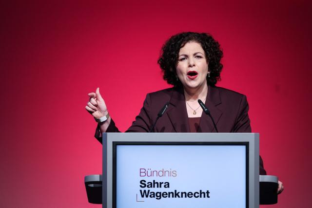 BSW co-leader Amira Mohamed Ali gives a speech during the federal party conference of left-wing populist Sahra Wagenknecht Alliance (BSW) in Magdeburg, eastern Germany on December 6, 2025. The party's 3rd federal congress takes place on December 6 and 7, 2025. (Photo by RONNY HARTMANN / AFP)