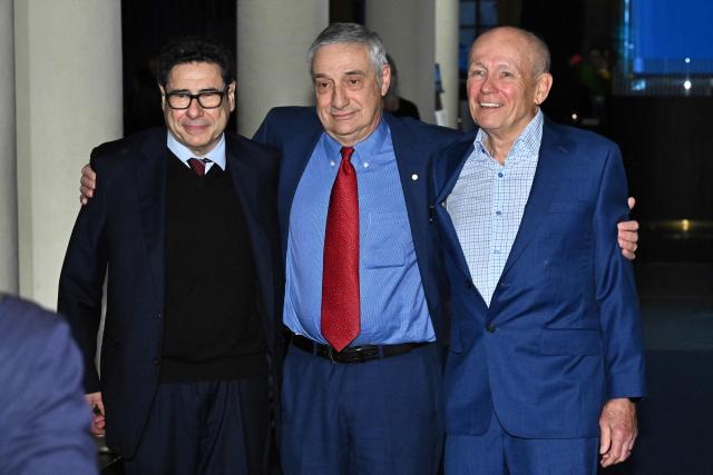 Laureates of The Sveriges Riksbank Prize in Economic Sciences 2025 French economist Philippe Aghion, US-Israeli economic historian Joel Mokyr and Canadian economist Peter Howitt pose upon arrival at the Nobel Museum in Stockholm on December 6, 2025. (Photo by Claudio BRESCIANI / TT News Agency / AFP) / Sweden OUT