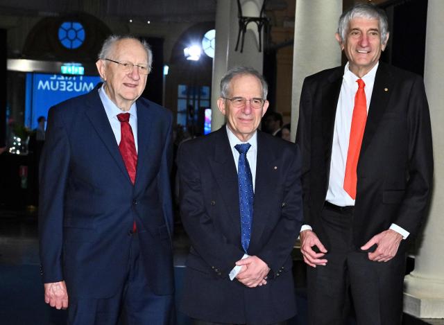 Nobel Prize in Physics 2025 laureate British physicist John Clarke, French physicist Michel H Devoret and US physicist John M Martinis pose upon arrival at the Nobel Museum in Stockholm on December 6, 2025. (Photo by Claudio BRESCIANI / TT News Agency / AFP) / Sweden OUT