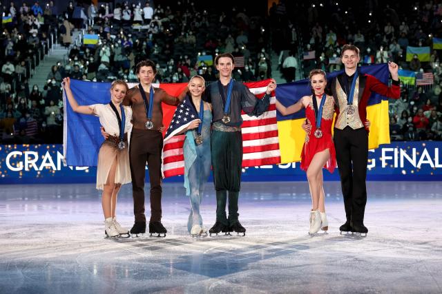 (L to R) Silver medallists France's Ambre Perrier Gianesini and Samuel Blanc Klaperman, gold medallists from the USA Hana Maria Aboian and Daniil Veselukhin and bronze medallists Ukraine's Iryna Pidgaina and Artem Koval pose during the medal ceremony for the Junior Ice Dance at the ISU Grand Prix of Figure Skating Final in Nagoya on December 6, 2025. (Photo by PAUL MILLER / AFP)