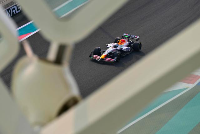 TOPSHOT - Racing Bulls' French driver Isack Hadjar drives during the third practice session ahead of the Abu Dhabi Formula One Grand Prix at the Yas Marina Circuit in Abu Dhabi on December 6, 2025. (Photo by Andrej ISAKOVIC / AFP)