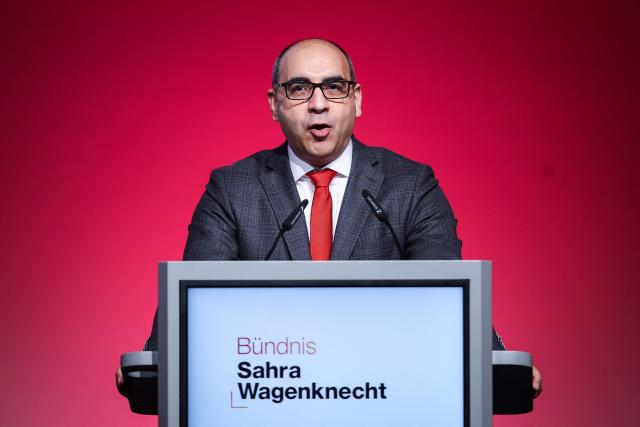 Deputy Chairman of Germany's of left-wing populist Sahra Wagenknecht Alliance (BSW) Shervin Haghsheno gives a speech during the federal party conference of left-wing populist Sahra Wagenknecht Alliance (BSW) in Magdeburg, eastern Germany on December 6, 2025. The party's 3rd federal congress takes place on December 6 and 7, 2025. (Photo by RONNY HARTMANN / AFP)