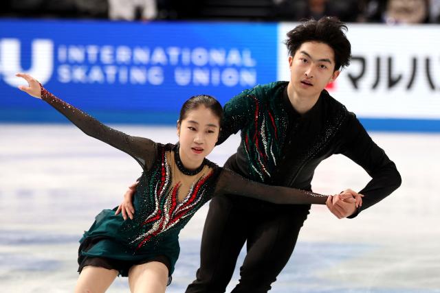 China's Rui Guo and Zhang Yiwen compete in the Junior Pairs Free Skating at the ISU Grand Prix of Figure Skating Final in Nagoya on December 6, 2025. (Photo by PAUL MILLER / AFP)