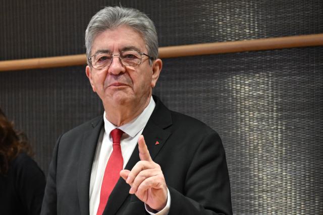 Founder of French left-wing La France Insoumise (LFI) party Jean-Luc Melenchon gestres during a hearing by the commission of inquiry “into the links between representatives of political movements and organizations propagating Islamist ideology” at the National Assembly in Paris, on December 6, 2025. (Photo by Bertrand GUAY / AFP)