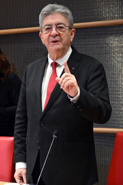 Founder of French left-wing La France Insoumise (LFI) party Jean-Luc Melenchon gestures during a hearing by the commission of inquiry “into the links between representatives of political movements and organizations propagating Islamist ideology” at the National Assembly in Paris, on December 6, 2025. (Photo by Bertrand GUAY / AFP)