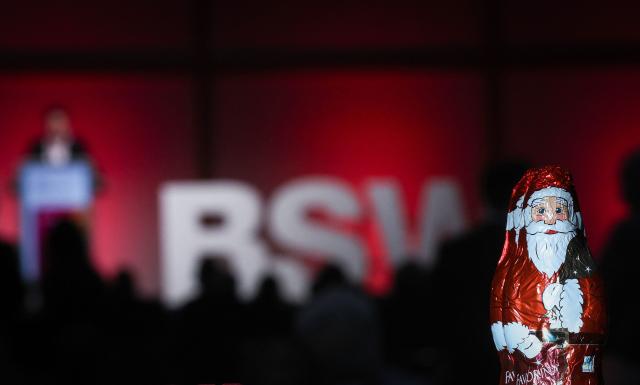 Delegates hold up voting cards during the federal party conference of left-wing populist Sahra Wagenknecht Alliance (BSW) in Magdeburg, eastern Germany on December 6, 2025. The party's 3rd federal congress takes place on December 6 and 7, 2025. (Photo by RONNY HARTMANN / AFP)