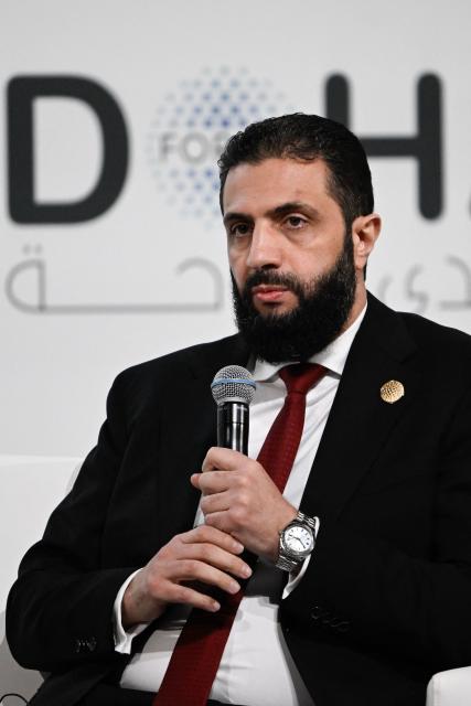 Syrian President Ahmed al-Sharaa speaks during the opening day of the Doha Forum, an annual diplomatic conference, in Doha on December 6, 2025. Sharaa warned on December 6 that Israel's demand for a demilitarised zone in southern Syria would endanger his country, as Israeli forces continue to operate in the area. (Photo by Mahmud HAMS / AFP)
