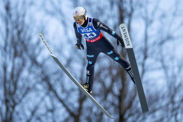 Germany's Philipp Raimund soars through the air during the Men's Large Hill HS134 competition of the FIS Ski Jumping World Cup in Wisla, Poland on December 06, 2025. (Photo by Wojtek RADWANSKI / AFP)