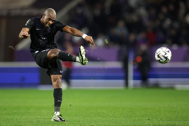Toulouse's French defender #19 Djibril Sidibe kicks the ball during the French L1 football match between Toulouse FC and RC Strasbourg Alsace at the TFC Stadium in Toulouse, southwestern France, on December 6, 2025. (Photo by Valentine CHAPUIS / AFP)