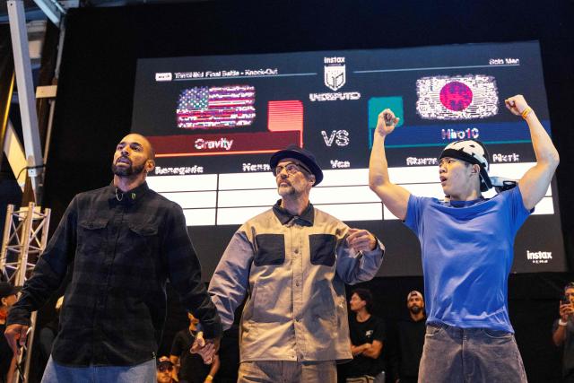 Japanese Break Dancer Hiro 10 celebrates after winning the Undisputed Cape Town length of Break Dance championship in Cape Town on December 6, 2025. (Photo by GIANLUIGI GUERCIA / AFP)