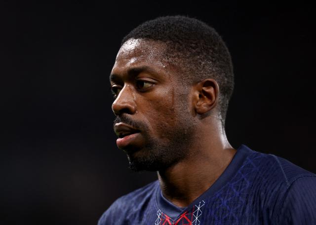 Paris Saint-Germain's French forward #10 Ousmane Dembele reacts during the French L1 football match between Paris Saint-Germain (PSG) and Stade Rennais FC at the Parc des Princes stadium in Paris on December 6, 2025. (Photo by FRANCK FIFE / AFP)