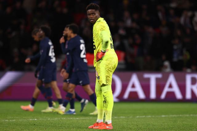 Rennes' French goalkeeper #30 Brice Samba reacts during the French L1 football match between Paris Saint-Germain (PSG) and Stade Rennais FC at the Parc des Princes stadium in Paris on December 6, 2025. (Photo by FRANCK FIFE / AFP)