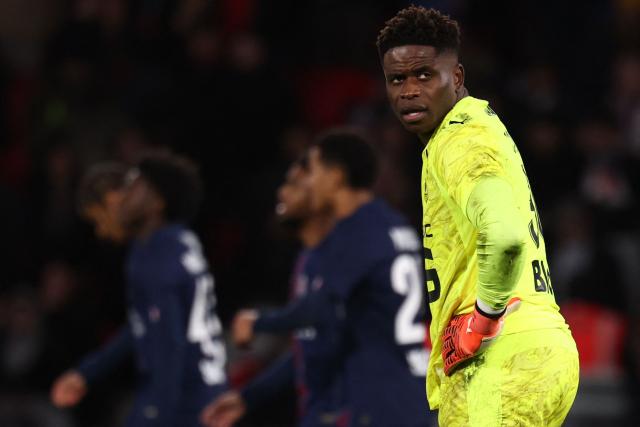 Rennes' French goalkeeper #30 Brice Samba reacts during the French L1 football match between Paris Saint-Germain (PSG) and Stade Rennais FC at the Parc des Princes stadium in Paris on December 6, 2025. (Photo by FRANCK FIFE / AFP)