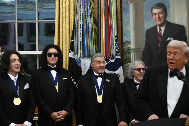 US President Donald Trump speaks during the Kennedy Centre Honours medal presentation ahead of tomorrow's ceremony, in the Oval Office of the White House in Washington, DC, December 6, 2025. (Photo by Brendan SMIALOWSKI / AFP)