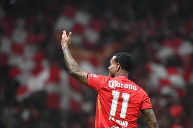 Toluca's Brazilian midfielder #11 Helinho celebrates after scoring a goal during the Liga MX Apertura semifinal second leg football match between Toluca and Monterrey at the Nemesio Diez stadium in Toluca de Lerdo, Mexico on December 6, 2025. (Photo by Mario Vazquez / AFP)