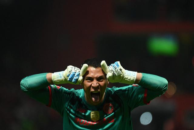 Toluca's goalkeeper #01 Hugo Gonzalez celebrates a goal scored by his team during the Liga MX Apertura semifinal second leg football match between Toluca and Monterrey at the Nemesio Diez stadium in Toluca de Lerdo, Mexico on December 6, 2025. (Photo by Mario Vazquez / AFP)