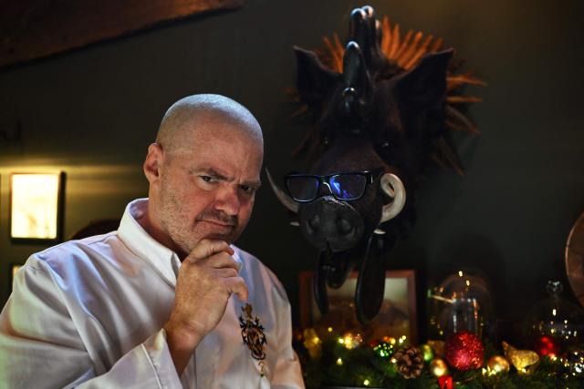 Chef Heston Blumenthal poses for a portrait in The Hinds Head in Bray, west of London, on November 19, 2025. When Michelin-starred UK chef Heston Blumenthal turned to skinny jabs to lose weight, his appetite evaporated and he realised the popularity of such medications risked biting into restaurant sales. So he devised a menu-lite, offering small plates of his star menu "The Journey", at his Fat Duck restaurant in the village of Bray, west of London. (Photo by JUSTIN TALLIS / AFP) / TO GO WITH AFP STORY By Caroline TAIX